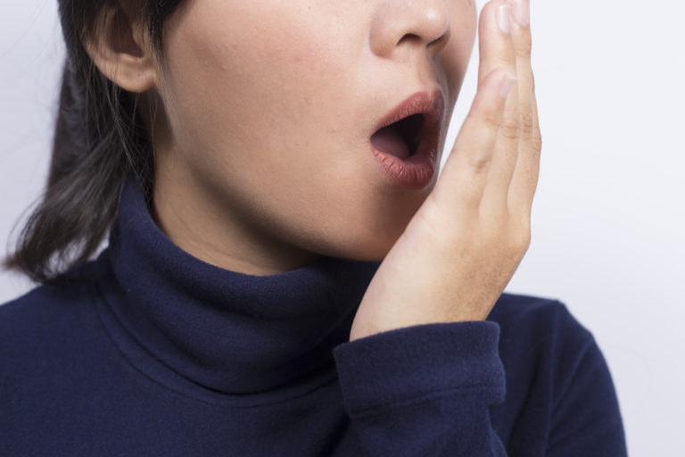 woman-smelling-breath
