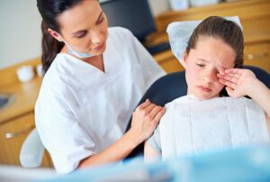 Nervous girl at the dentist