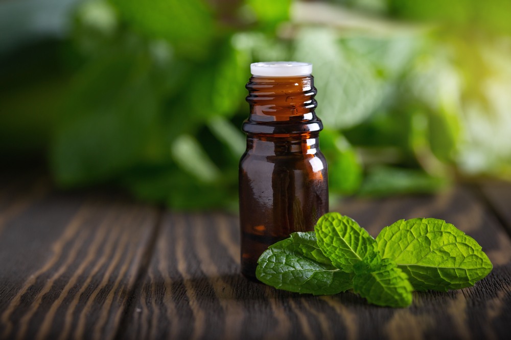 Amber bottle of peppermint essential oil