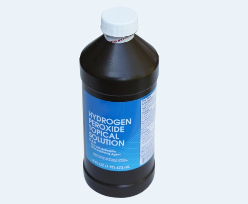 Hydrogen peroxice topical solution in brown bottle